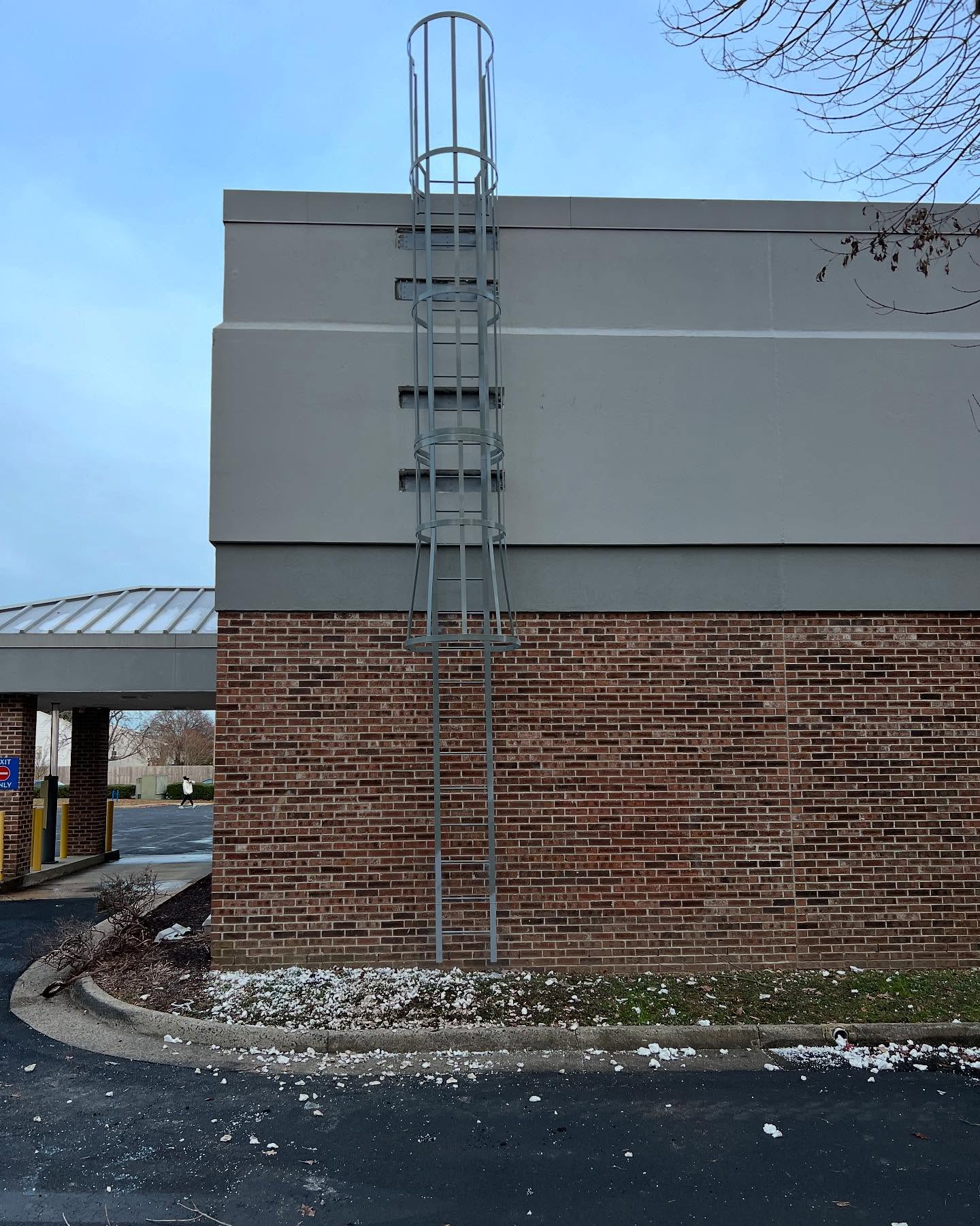 Fixed roof access ladder installation on commercial building in Virginia Beach