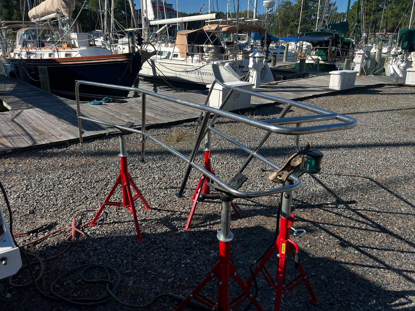 Bow pulpit mounting reinforcement on a boat