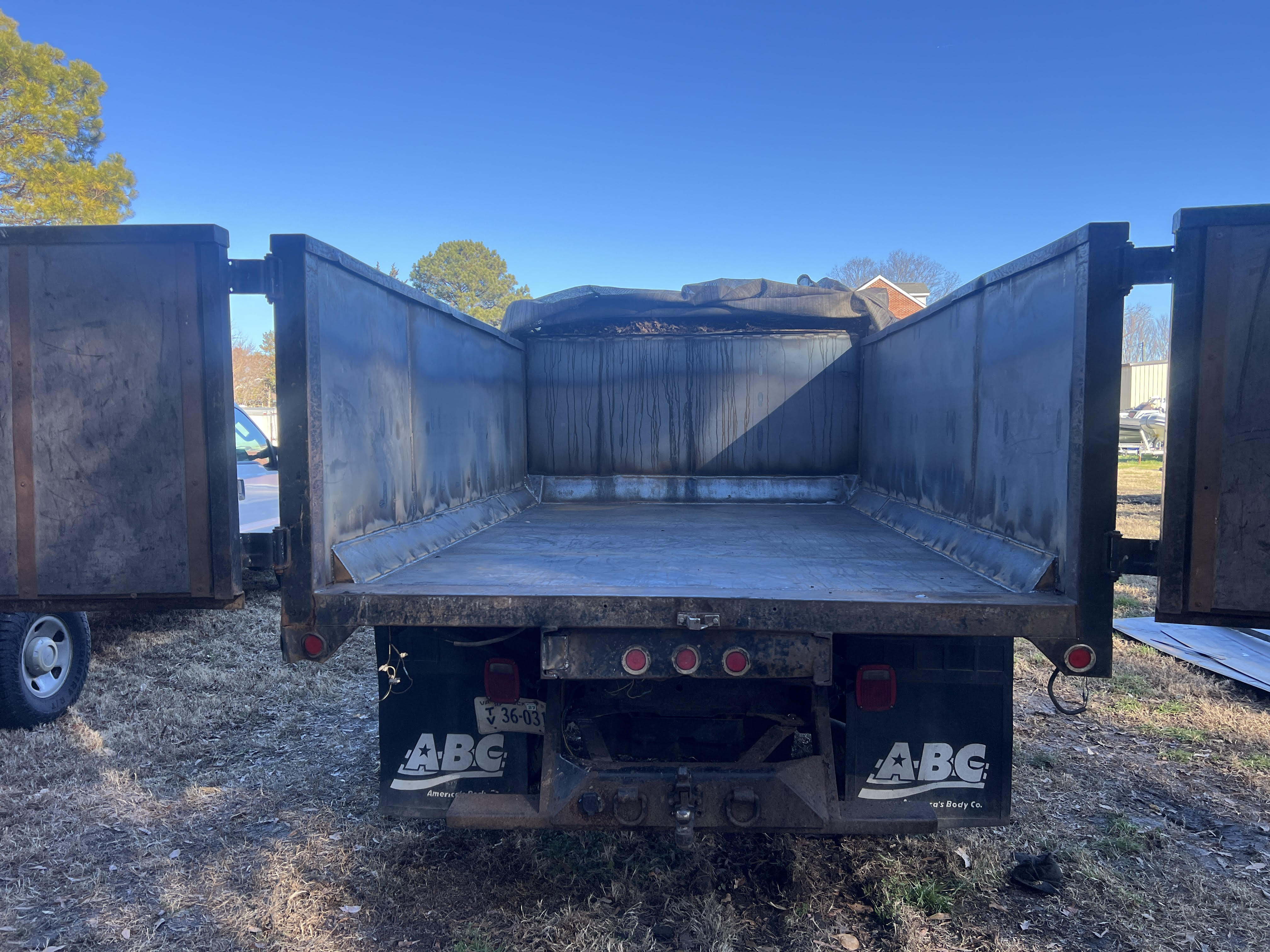 Mobile welding and steel floor replacement on a landscaping dump truck in Yorktown Virginia