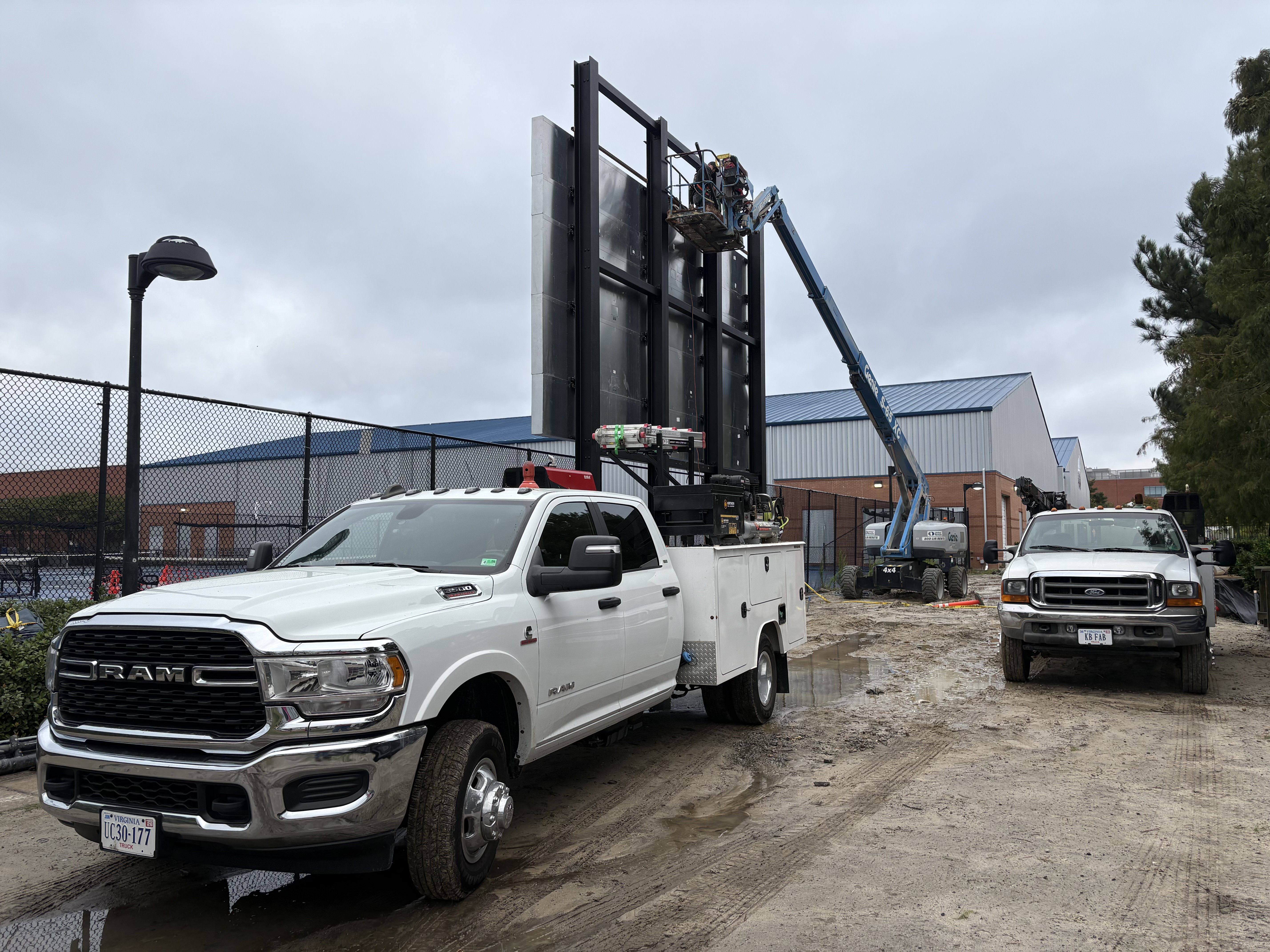 Structural welding for a large sign at Old Dominion University tennis courts